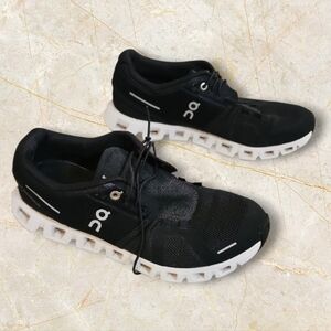 On Cloud Women's Black and White Running Sneakers